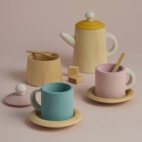 Teeservice aus Holz senfgelb/pink