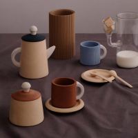 Teeservice aus Holz terra/blau